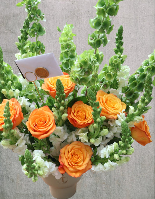 Arreglo de rosas naranjas